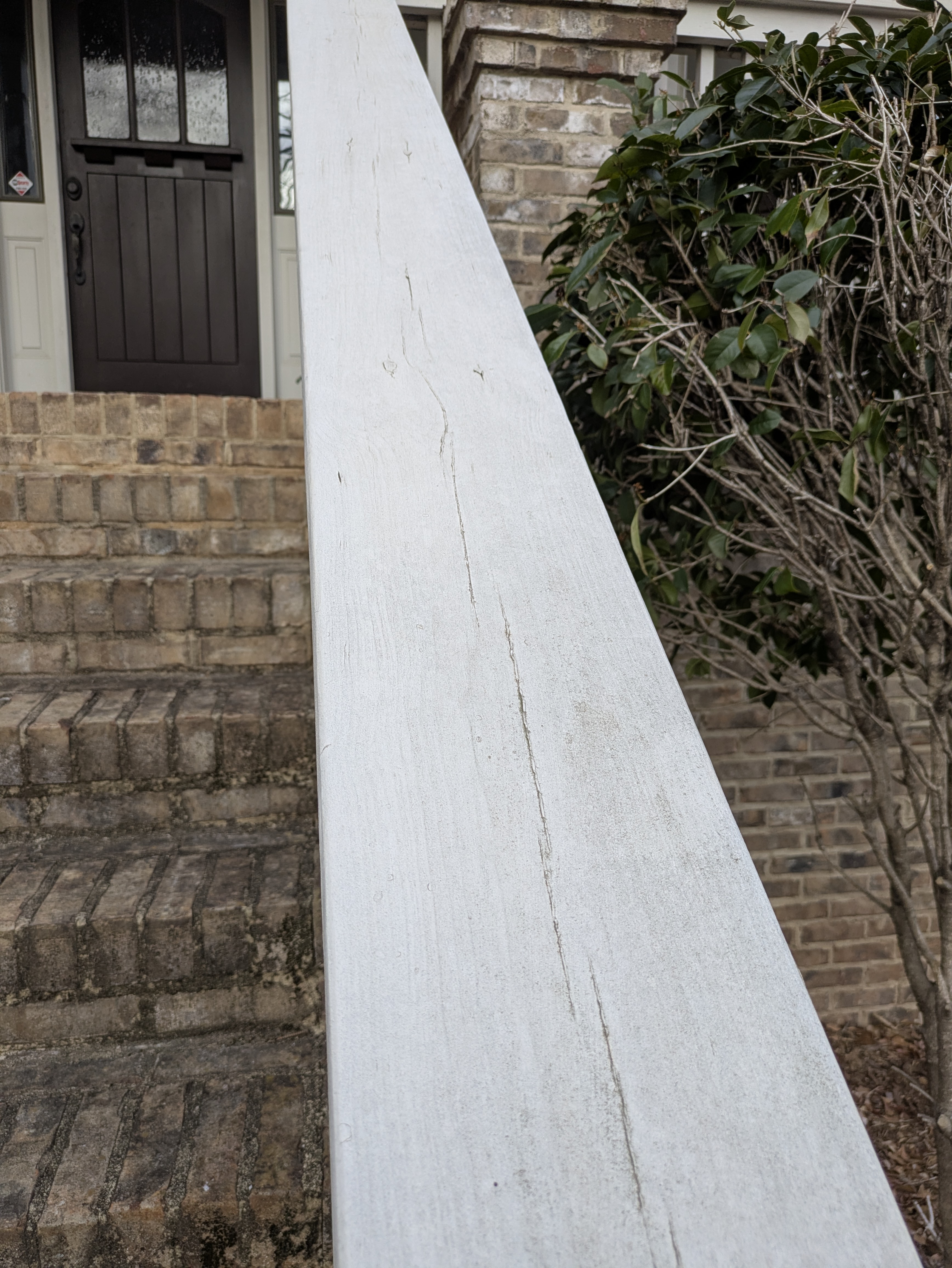 Newly painted white trim on an Athens GA cottage exterior